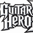 Pixelated 'Guitar Hero' text in bold white letters with black outlines on a split background of white and gray.