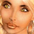 A pixelated close-up of a person's face showing eyes, nose, mouth, and ear with visible hair strands, rendered in warm orange and brown tones.