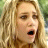 A 48x48 pixel buddy icon featuring a split composition with a blonde woman on the left and text elements on the right, part of an animated contact sheet.