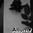 Pixelated grayscale image of a stylized figure with dark hair and clothing against a light background, featuring partial text at the bottom.