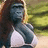 A pixelated image shows a woman with long brown hair wearing a white top, standing outdoors with greenery in the background and blue text reading "Hey Baby!" on the right.