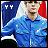 Pixelated image of a person with light hair wearing blue clothing, standing against a dark background with white and red elements.