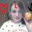 A pixelated image shows a person with dark hair wearing a white top, red heart symbol on left, orange circular object on right.