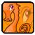 Pixelated orange icon with abstract shapes and a small purple-and-white detail, framed by black border on gray background.