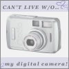 A silver digital camera icon with 'CAN'T LIVE W/O...' text above and 'my digital camera!' below, set against a light purple background.