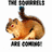 Pixelated orange-brown cat with red eyes curled in a ball, tail raised upward, on white background.