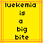 Yellow background with orange lines, black pixelated text reading 'luekemia is a big bite' in four