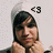 Pixelated image of a person with dark hair and light skin, wearing a sleeveless top, holding hands near the neck against a light background.