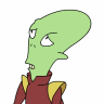 Green-skinned cartoon character with large eyes and a long nose, wearing a red outfit with yellow shoulder accents, facing left with a neutral expression.