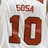Static pixelated image of a white sports jersey with brown text and numbers.