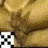 A pixelated image shows a brown animal with large ears and a white-and-black checkered pattern in the bottom-left corner.