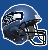Pixelated blue football helmet with white and black accents, featuring a green dot on the side against a solid blue background.