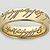 A circular gold ring with engraved text on its outer surface, displayed against a light gray background.