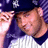 Pixelated image of two baseball players in pinstripe uniforms with text labels on a solid blue background.