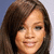 A static pixelated image of a person with long brown hair and light skin, smiling against a gradient background.