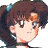 Pixelated anime-style character with brown hair and blue hair accessory, next to black background with white text 'AnimeIM' and 'c0m' in pixelated font.