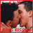 six identical pixelated images showing two young men kissing, each with a colored border and heart symbol above text reading "BOYS KISSING"