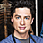 A pixelated contact sheet showing two frames of an animated buddy icon featuring a person in a blue shirt on the left and NBC branding with "[scrubs]" text on the right.