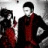 A red background displays text and a grayscale image of two figures in formal attire, with one figure holding the other's hand.