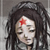 Pixelated image of a person with long dark hair and a red star on their forehead, closed eyes, and a neutral expression.