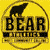 Yellow circular icon with black bear silhouette above bold text reading 'BEAR' and smaller text below, all within a rounded border.