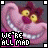 nine identical pixelated images showing a pink Cheshire Cat with yellow eyes and purple nose, grinning widely against a dark gray background