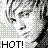 Pixelated static icon featuring a stylized face with abstract background elements and bold text at the bottom.