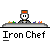 Pixel art icon of a chef character with white face, black eyes, and gray hat featuring orange cross on top, standing behind a counter with colored blocks.