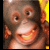 A pixelated monkey face with a wide grin appears on the left, next to blue text reading 'Monkey drool!' on a solid background.