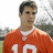 A pixelated image of a person in an orange sports jersey with the number 10, next to text on a dark red background.