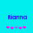 Pixelated blue text 'Rianna' on cyan background with two of pink and purple asterisk-like symbols below