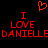 Red pixelated text "I LOVE DANIELLE" repeated twice with an orange heart symbol above on a black background.