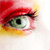Pixelated close-up of a human eye with green iris, black pupil, and red eyelid, set against a gradient background of yellow and white.