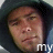 A static image of a person in a hooded garment with text overlay reading 'my favorite wild boy' across multiple