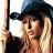 Pixelated static image of a person with long blonde hair wearing a dark cowboy hat, holding a vertical object against a white background.