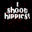 Pixelated text "I shoot Hippies!" on black background with red speckles, five identical frames arranged in two