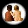 Circular icon shows two children sitting back-to-back with a white border; text above reads 'Hatred must be taught!' in white serif font on black background.