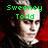 Pixelated image of a person with light skin and dark hair, wearing a dark top with a white collar, against a black and red background with green text.