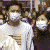 A 3x2 contact sheet of five animated frames showing a crowd wearing face masks with one frame featuring text asking "NOW WHO'S THE CRAZY ONE?" and another showing a masked figure in purple attire.