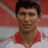 Static 48x48 pixel icon of a person in red and white sports attire against a blurred background with visible dithering and low-resolution rendering artifacts.