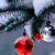 six pixelated holiday-themed images including ornaments, gifts, and a snow scene with one frame showing glowing eyes