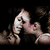 Animated sequence showing a couple kissing, a close-up of a woman's face, and two women embracing against a pink background.
