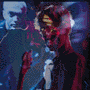 Animated sequence showing a figure with red hair and dark clothing in blue-toned settings, transitioning from side profile to back view while holding an object.