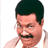Pixelated static image of a man's face with dark hair, mustache, and light skin tone against white background.