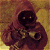 Pixelated static image of a dark figure with glowing eyes against a gradient background, appearing to be a low-resolution cartoon or icon representation.