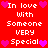 Red background with white pixelated text reading "In love With Someone VERY Special" repeated twice, each line flanked by pink and purple heart icons.