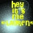 Yellow pixelated text on a dark background with light effects, displaying 'hey it's me LAUREN' in four identical