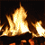 Animated fire with flickering flames and glowing embers on dark background, showing dynamic motion