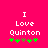 Bright pink background with white text reading "I Love Quinton" and five green plus signs below, one brown sign in the middle.