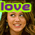 A pixelated image shows a person with long brown hair wearing a bright green rectangular frame containing purple text reading 'love' above their head.